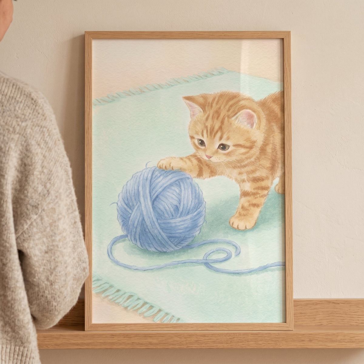 Playful Orange Kitten with Blue Yarn Digital Art